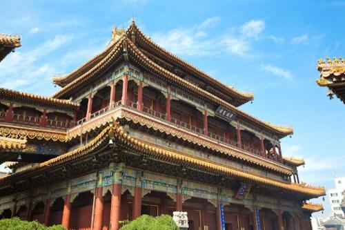 a large building with a pagoda at Jianguo Garden Hotel in Beijing