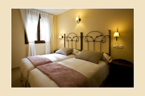 Ένα ή περισσότερα κρεβάτια σε δωμάτιο στο Casa Tia Paula