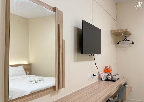 TV a/nebo společenská místnost v ubytování Jacky Chan Hotel