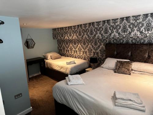 Ένα ή περισσότερα κρεβάτια σε δωμάτιο στο 5 Halifax House, apartment 3