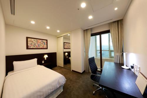 Cama o camas de una habitación en Orakai Insadong Suites