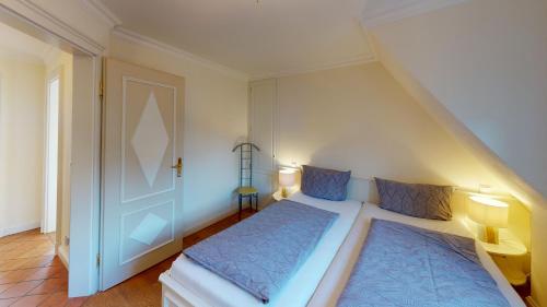 En eller flere senge i et værelse på Senbloom Huis HT 2