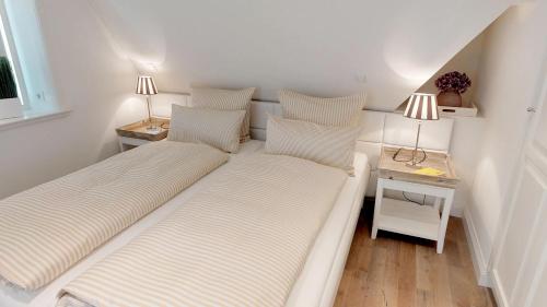 En eller flere senge i et værelse på Min Söl