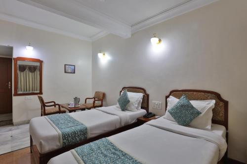 Cama o camas de una habitación en Hotel Yadgar
