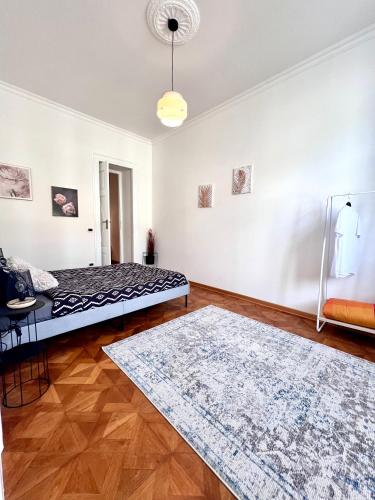 Suite Mitteleuropa private parkingにあるベッド