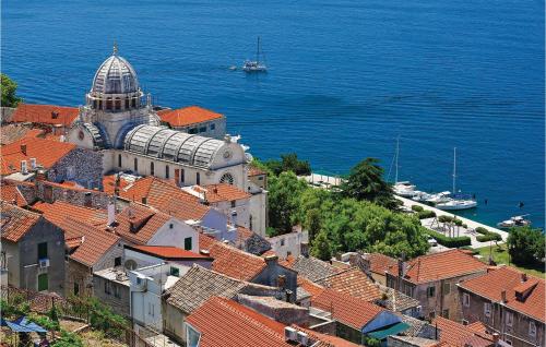 an aerial view of a town with red roofs at Apartment Sibenik With Sea View Xii in Krapanj