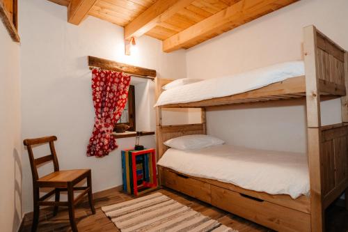 Postel nebo postele na pokoji v ubytování Boton d'Or
