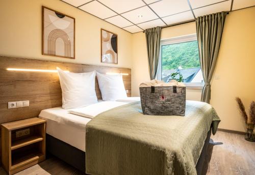 Postel nebo postele na pokoji v ubytování Apart Hotel Lang