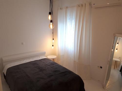 Postel nebo postele na pokoji v ubytování VK's Downtown Suite