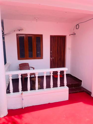 Ένα ή περισσότερα κρεβάτια σε δωμάτιο στο Yogi home stay
