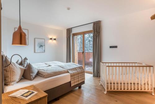 Postel nebo postele na pokoji v ubytování Schartneralm Birke