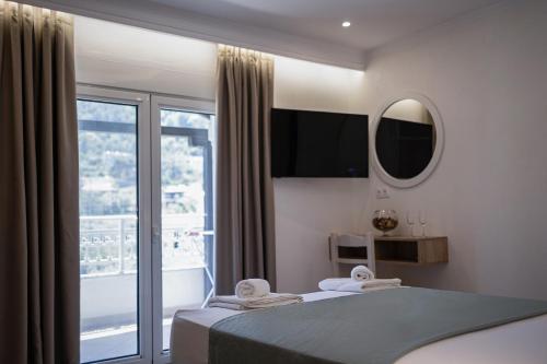 Ένα ή περισσότερα κρεβάτια σε δωμάτιο στο Erics Apartment