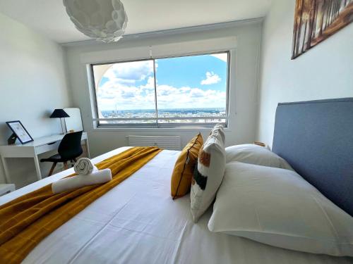 Cama o camas de una habitación en L Horizon, Rennes centre
