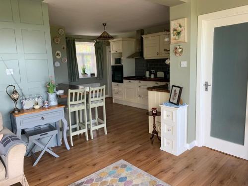 Köök või kööginurk majutusasutuses Country Cosy Cottage