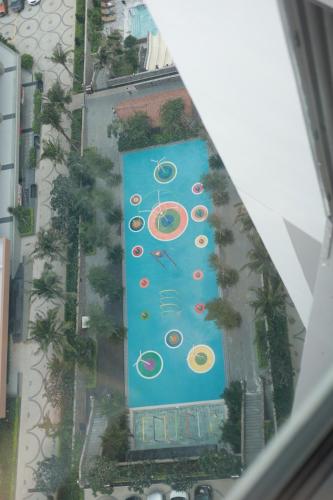 an aerial view of a pool at a resort at APEC Mandala Mũi Né in Mui Ne