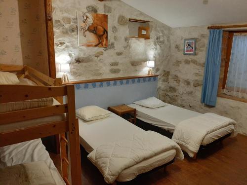 Ένα ή περισσότερα κρεβάτια σε δωμάτιο στο Pommayrac nature