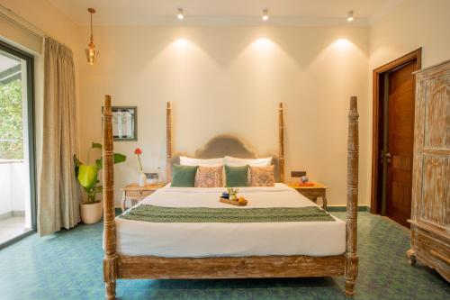 Cama o camas de una habitación en ELIVAAS 4 BHK with Pvt Pool & Jacuzzi bathtub - Laguna Pulse
