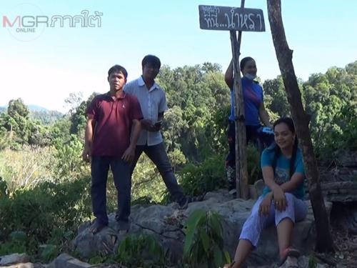 a group of people standing on top of a rock at vasita homestay satun in Ban Thung Nui
