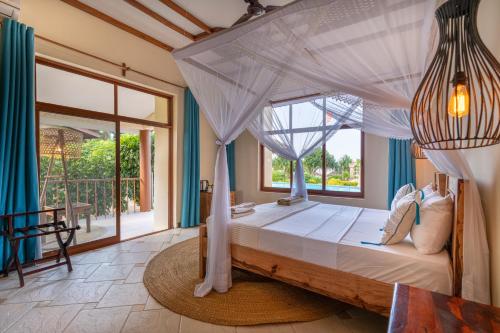 Marafiki Beach Hotel & SPAにあるベッド