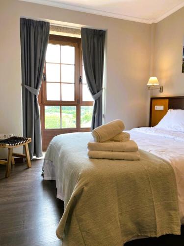 Postel nebo postele na pokoji v ubytování Casa Donato