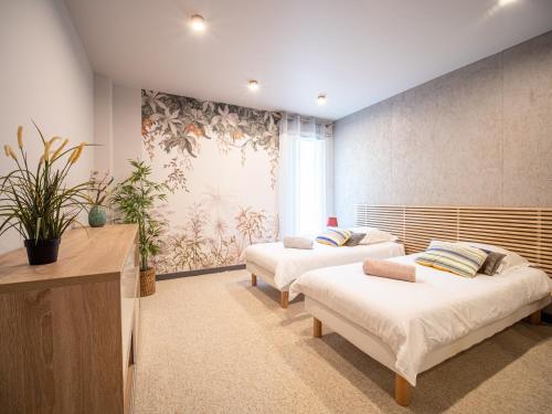 Postel nebo postele na pokoji v ubytování PRESTIGIEUSE villa avec SPA vue horizon mer proche Montpellier
