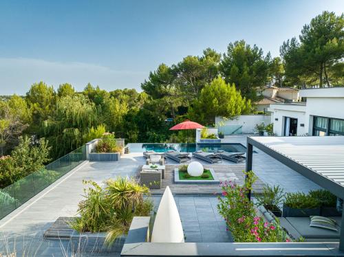 Taman di luar PRESTIGIEUSE villa avec SPA vue horizon mer proche Montpellier