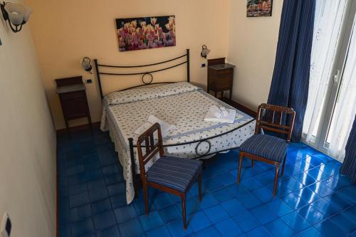 Katil atau katil-katil dalam bilik di Villa Sciare Modò