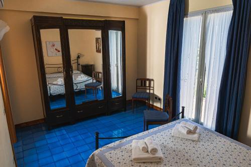 Katil atau katil-katil dalam bilik di Villa Sciare Modò