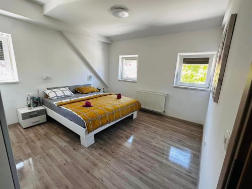 Postel nebo postele na pokoji v ubytování Apartmani LU&LO