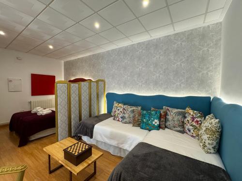 Posteľ alebo postele v izbe v ubytovaní ATENEO LOFT LUXURY Apartamento de 70 metros