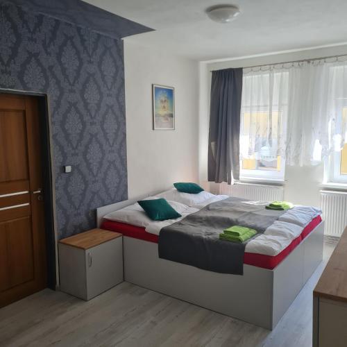 Postel nebo postele na pokoji v ubytování Hauptmann5