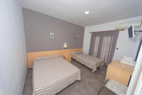 Hostal Virginiaにあるベッド