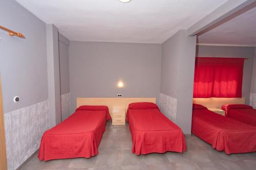 Hostal Virginiaにあるベッド