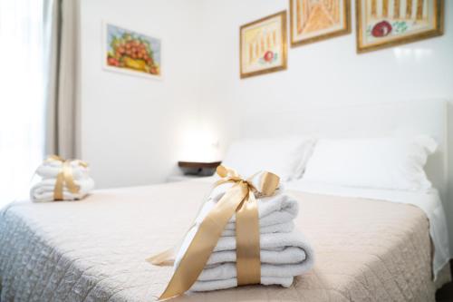 Letto o letti in una camera di B&B La Melagrana