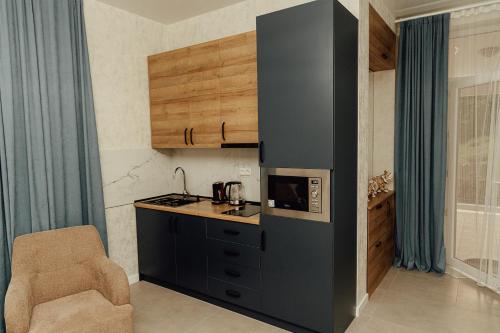 Kuchyň nebo kuchyňský kout v ubytování Tskaltubo Apartments