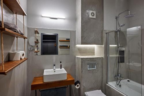 a bathroom with a sink and a shower at Sunny Beach Club - Adults Only #YouthfulVibes in Sunny Beach