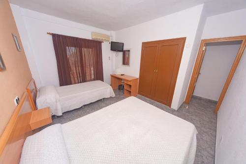 Hostal Virginiaにあるベッド