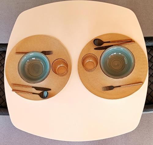 two cups on top of a table with chopsticks at Gredos Estelar in Navatalgordo