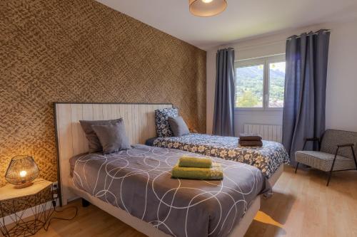 En eller flere senge i et værelse på Eden Lac et Montagnes