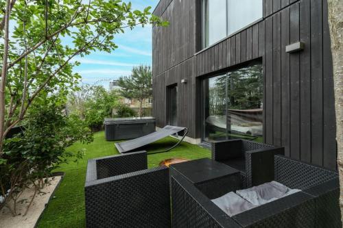 Photo de la galerie de l'établissement Appartement luxueux avec jardin, à Issy-les-Moulineaux
