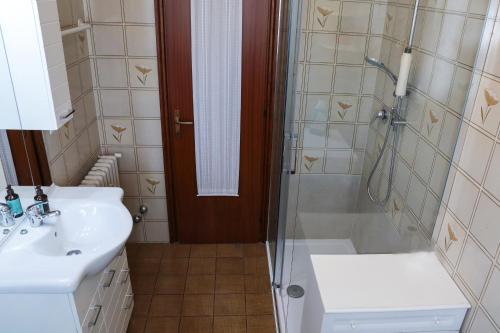 a bathroom with a shower and a sink at Guest House Bagnolo in Bagnolo in Piano