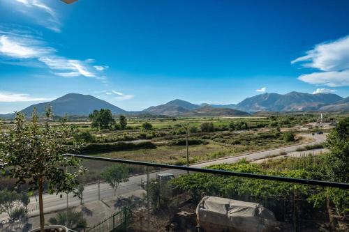 a view of the mountains from the balcony of a house at JUER Hotel in Bajkaj