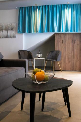 Posezení v ubytování Joy Apartments