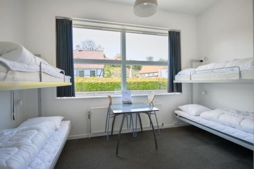 Postel nebo postele na pokoji v ubytování Roskilde Danhostel