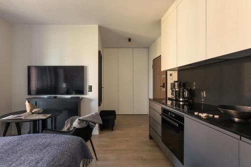 Η κουζίνα ή μικρή κουζίνα στο Scala Apartamenty by Moderna Profit- Łąkowa 60E z parkingiem