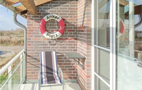 a sign on the side of a brick building at Apt 3 Hohen Wieschendorf in Hohen Wieschendorf