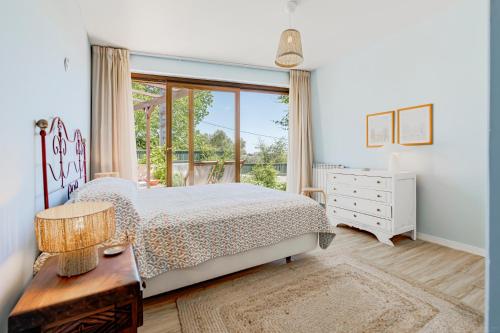 Ένα ή περισσότερα κρεβάτια σε δωμάτιο στο Casa de São José