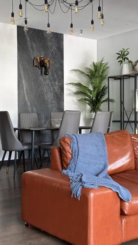 Posezení v ubytování Grand Orlov Apart Hotel