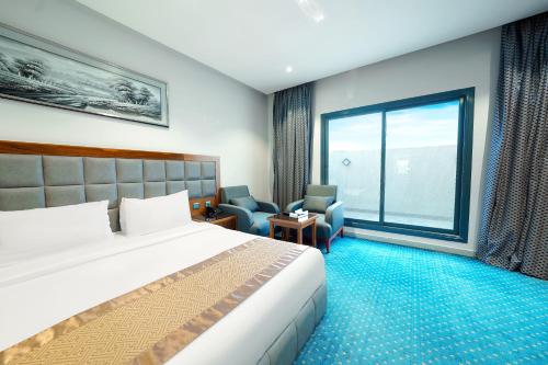 Ένα ή περισσότερα κρεβάτια σε δωμάτιο στο Celine Home Serviced Apartment - Tuwaiq