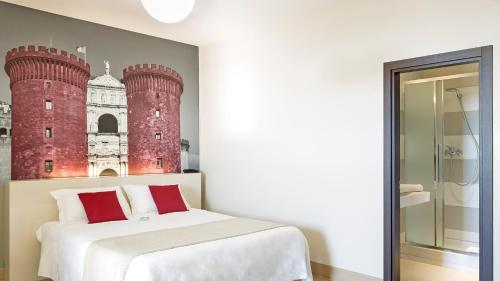 Postel nebo postele na pokoji v ubytování B&B Hotel Napoli
